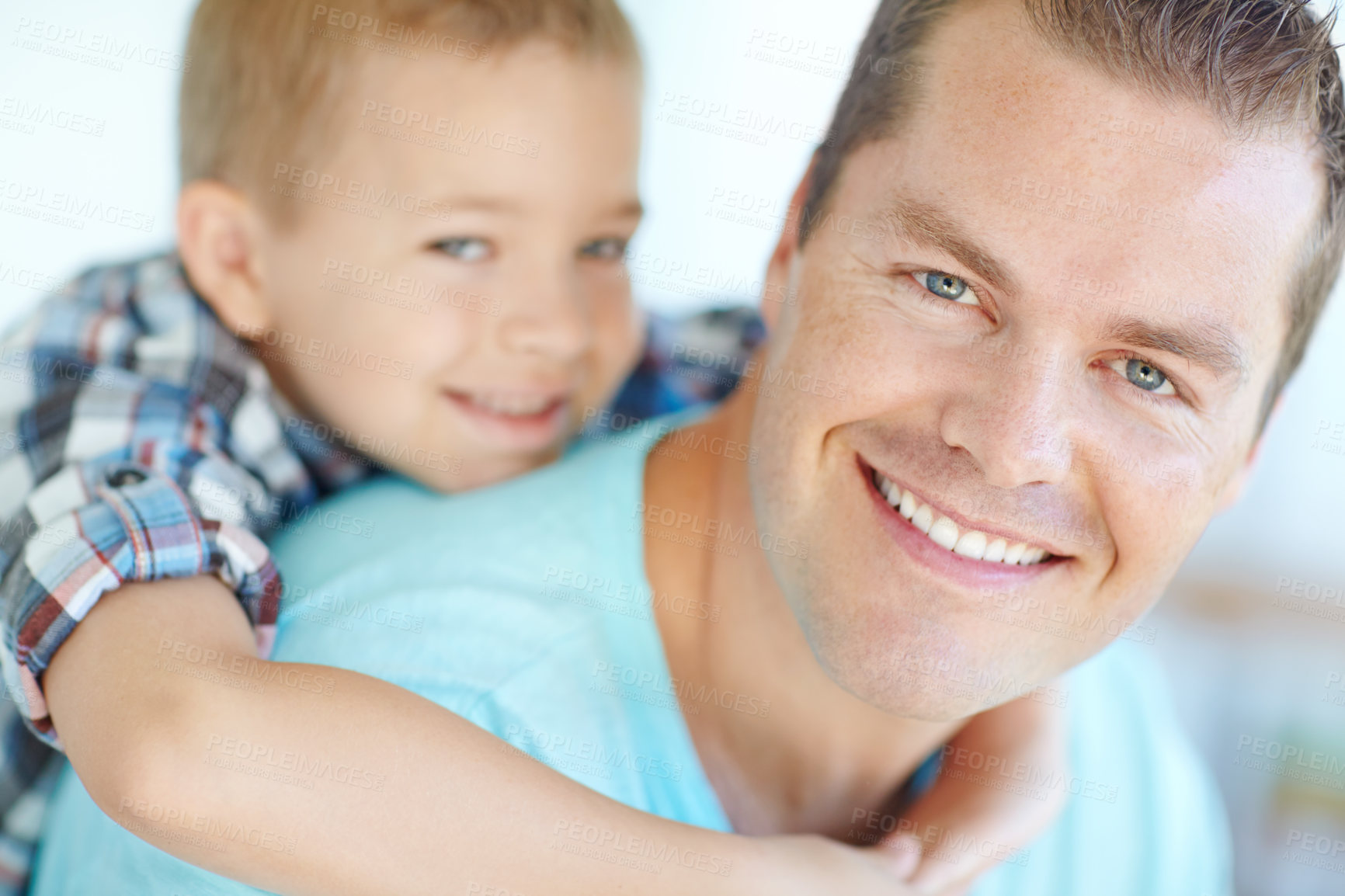 Buy stock photo Portrait, piggy back and father with boy, smile and bonding together with happiness in lounge. Family, single parent and dad carrying son, cheerful and childhood with fun, playful and game in house