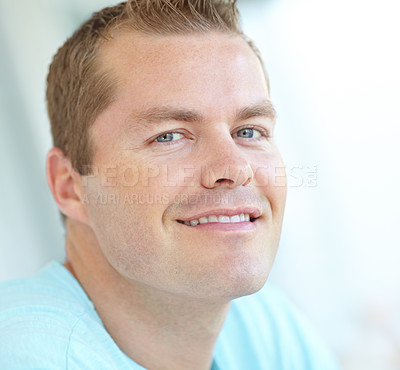 Buy stock photo Happy, relax and portrait of man in home with positive attitude, chilling or resting in living room. Smile, calm and face of male person from Germany with confidence and pride in lounge at apartment.