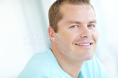 Buy stock photo Smile, relax and portrait of man in home with positive attitude, chilling or resting in living room. Happy, calm and face of male person from Germany with confidence and pride in lounge at apartment.