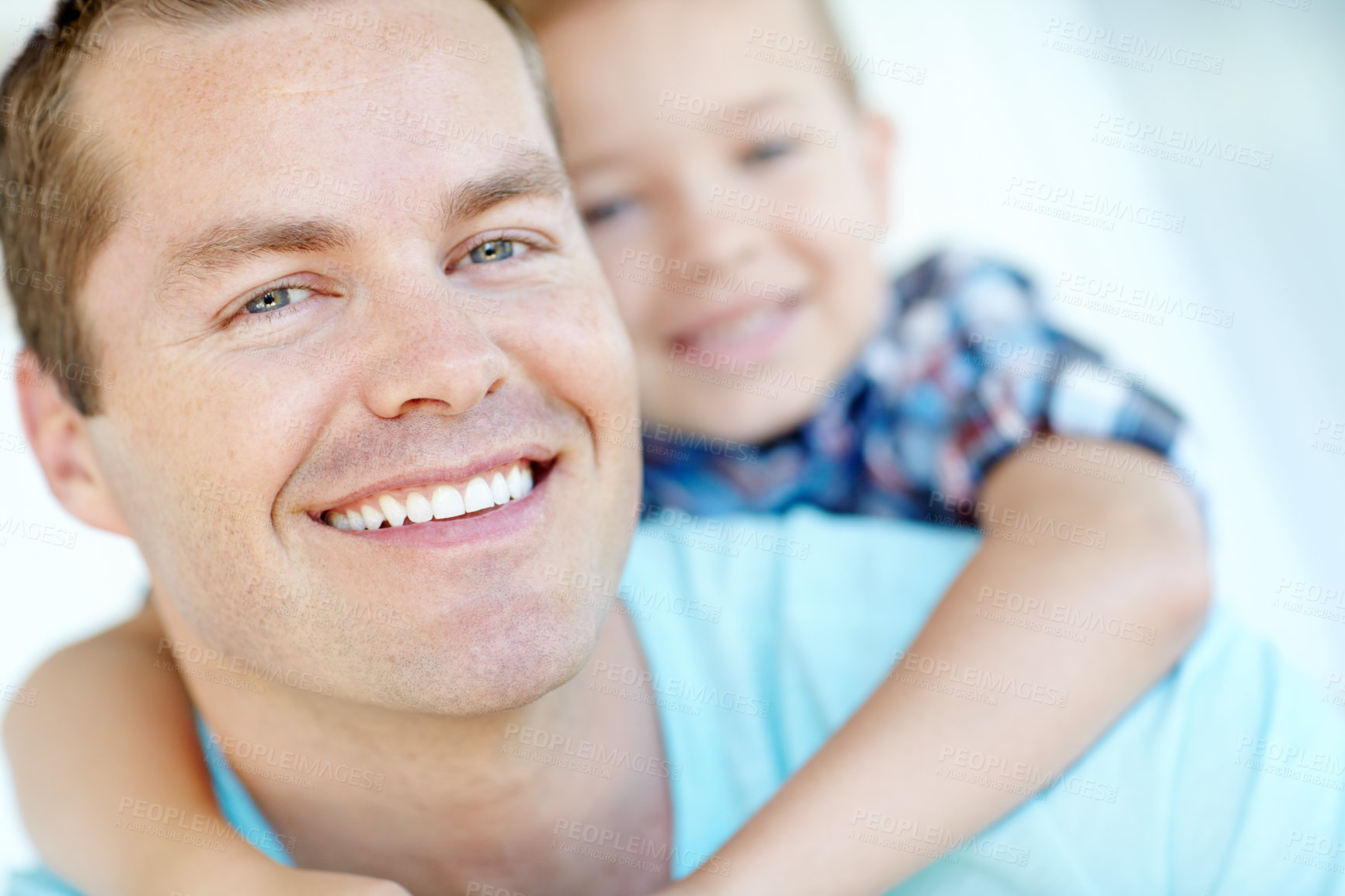 Buy stock photo Smile, father and piggyback son at house with safety, bonding together and love of relationship care. Happy, man and child with calm morning, weekend break and family support for embrace at apartment