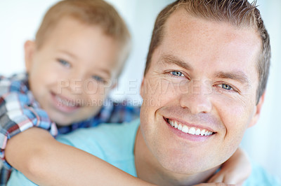 Buy stock photo Piggyback, father, and son with portrait at house of safety, bonding together and love of relationship. Happy, man and child for calm morning, weekend break and family support of embrace at apartment