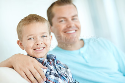 Buy stock photo Portrait, dad and child relaxing at house with safety, bonding together and love of relationship care. Happy, man and son for calm morning, weekend break and family support with embrace at apartment