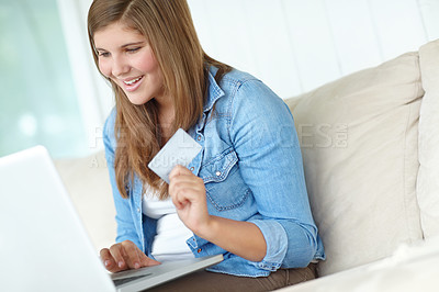 Buy stock photo Woman, laptop and smile with credit card in home for online banking, purchase and digital payment. Sofa, fintech and happy person with research for ecommerce, platform and verification of transaction