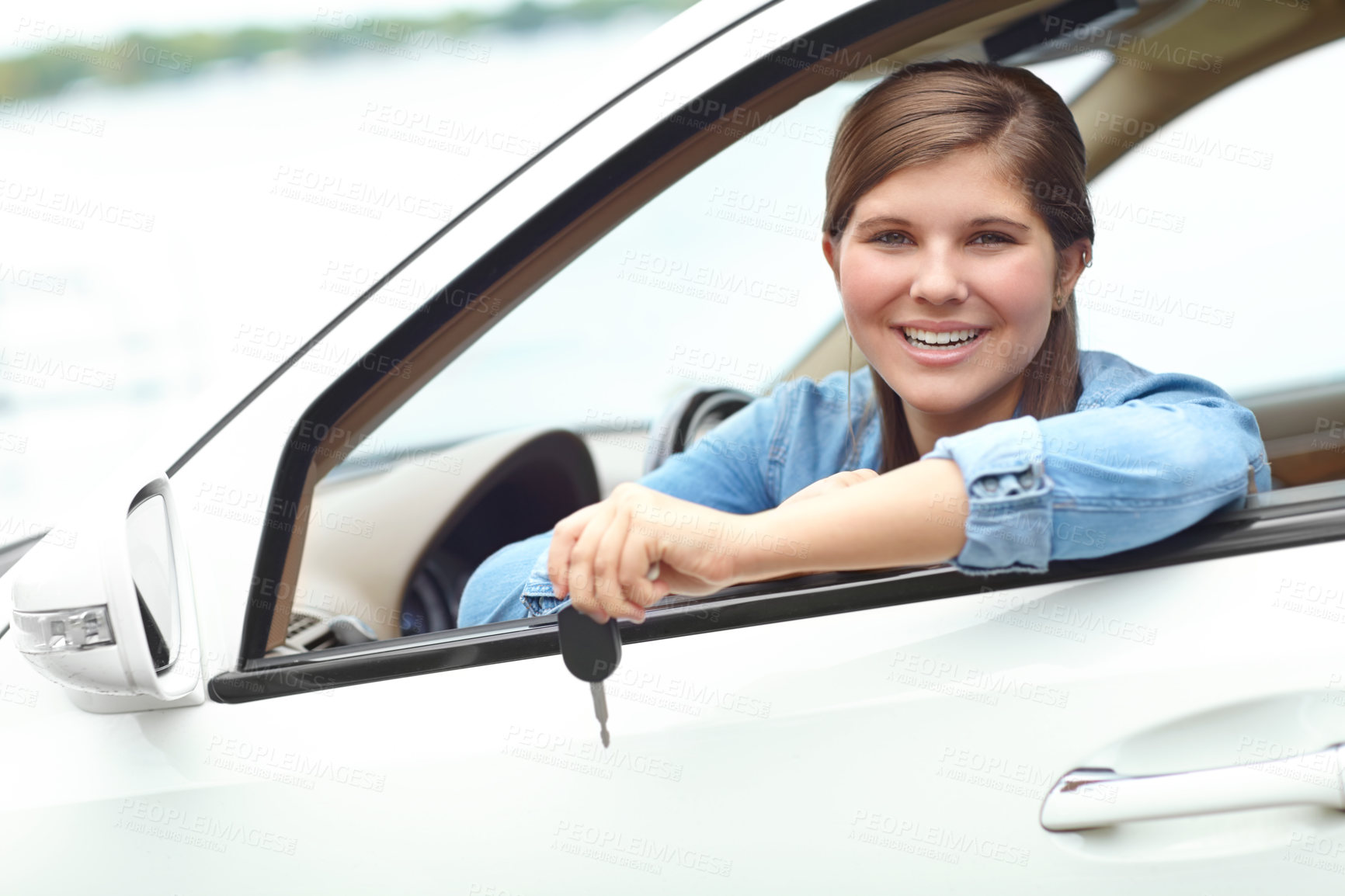 Buy stock photo Smile, portrait and teenager in car with keys for purchase, investment or vehicle gift in driveway. Driver, happy and girl from Canada by window for transport, commute or motor ownership with present