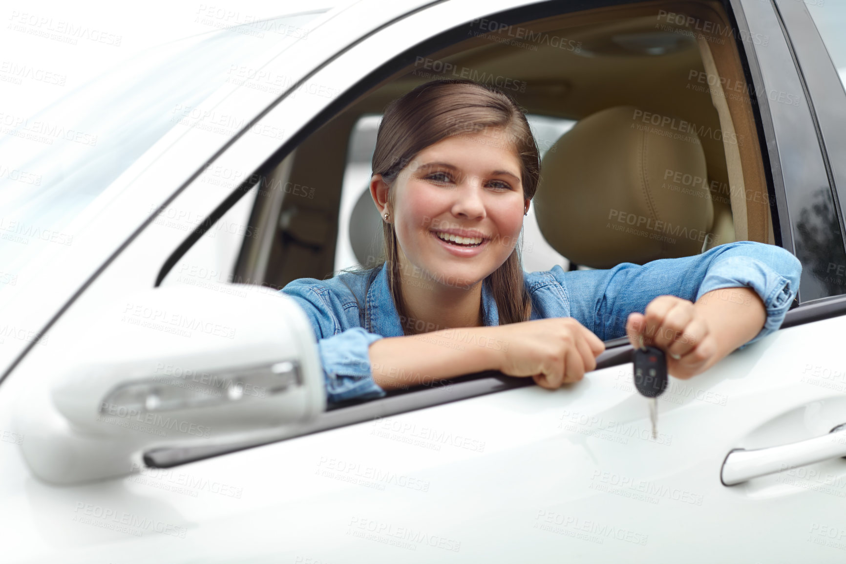 Buy stock photo Driver, portrait and teenager in car with keys for purchase, investment or vehicle gift in driveway. Happy, smile and girl from Canada by window for transport, commute or motor ownership with present