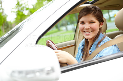 Buy stock photo Happy girl, portrait and driver with car in neighborhood for travel, commute or transportation service. Young, female person or vehcile owner with smile for road trip, ride or safe journey in nature