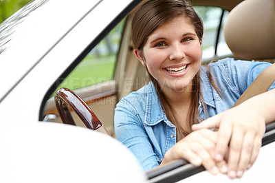 Buy stock photo Happy girl, portrait and window with car for road trip, license or travel in neighborhood. Young, female person or driver with smile for freedom or ride in motor vehcile for commute or transportation