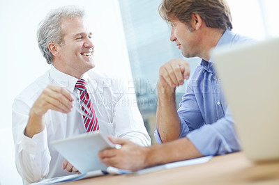 Buy stock photo Two mature businessmen in a meeting at the office