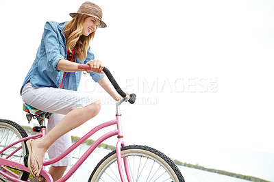 Buy stock photo Outdoor, rider and woman with bicycle, transport and eco friendly with reduced emissions and weekend. Mockup, happy and person with bike, ride and cycling in morning, active and energy for commuting