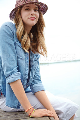 Buy stock photo Portrait, girl and jetty on lake for holiday, break and vacation with happiness, feet or relax. Female person, smile and travel on pier for freedom, outdoor adventure or peace as tourist in Indonesia