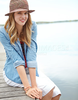 Buy stock photo Portrait, woman and jetty for vacation, break or holiday with happiness, sky and relax on lake. Female person, smile and travel on pier for freedom, outdoor adventure or peace as tourist in Indonesia