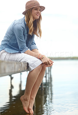 Buy stock photo Thinking, woman and jetty for vacation, travel or holiday with happiness, sky and relax on lake. Female person, smile and freedom on pier for ideas, outdoor adventure or peace as tourist in Indonesia