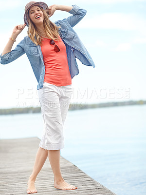 Buy stock photo Holiday, fashion and portrait of happy woman on pier with smile, relax and outdoor adventure in nature. Dock, lake and girl on travel vacation with casual style, confidence and calm morning in Canada