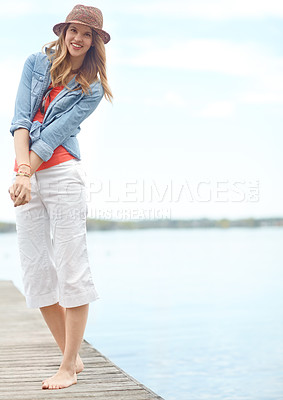 Buy stock photo Vacation, fashion and portrait of happy woman on pier with smile, relax and outdoor adventure in nature. Dock, lake and girl on travel holiday with casual style, confidence and calm morning in Canada