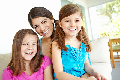 Buy stock photo Home, smile and portrait of woman with kids for development, care and bonding together on weekend. Happy, daughter and mother with children in house for family connection, love and relaxing on sofa