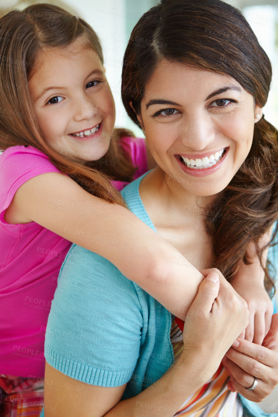 Buy stock photo Happy mother, portrait and piggyback child in family home for love, care and bonding together. Face, mom and hug girl for support, connection and trust single parent with foster daughter in Finland