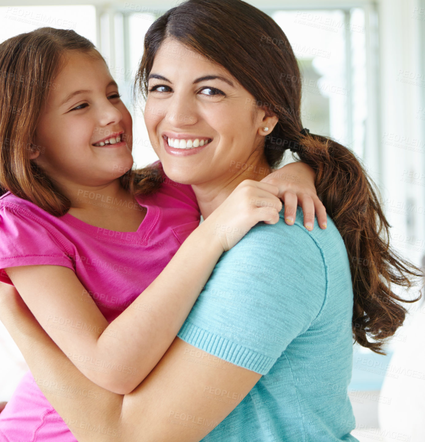 Buy stock photo Smile, mother and hug child in home for love, care and family bonding together in living room. Happy girl, mom and embrace kid for support, connection and trust single parent with adopted daughter