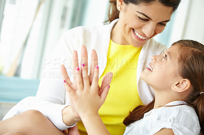 Buy stock photo Hug, mom and love for child, family and bonding with daughter, calm and comfort for girl and affection. Embrace, mother and care for kid, relax and motherhood for woman, adoption and together in home