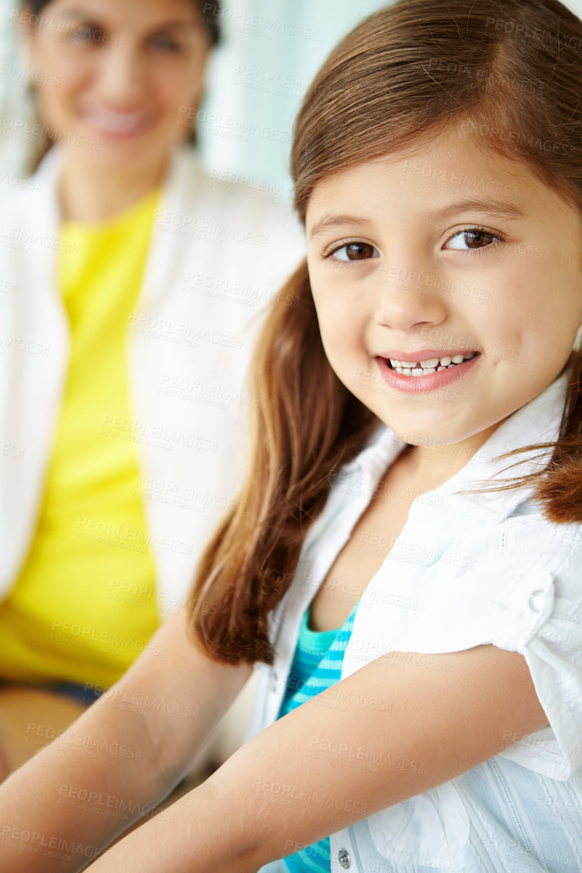 Buy stock photo Blur, parent and portrait of child in home for fun on weekend in living room of family house. Smile, satisfaction and face of kid on couch with parent for happiness, comfort and childhood in Spain