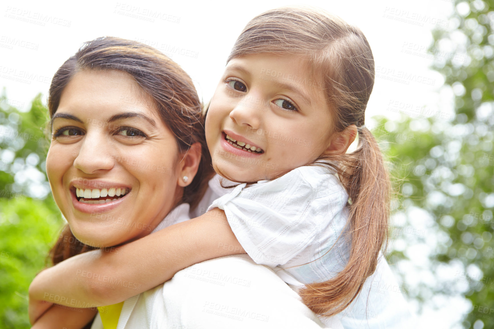 Buy stock photo Portrait, mom and child with piggy back in garden for fun bonding, relax and outdoor adventure together. Happy, mother and daughter in backyard with support, love and hug on weekend morning in nature