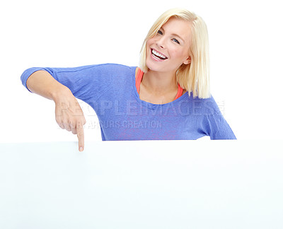 Buy stock photo Blank, sign and portrait of woman in studio with pointing, smile or deal promo for giveaway info. Billboard, news announcement and girl with poster mockup, card or offer space on white background