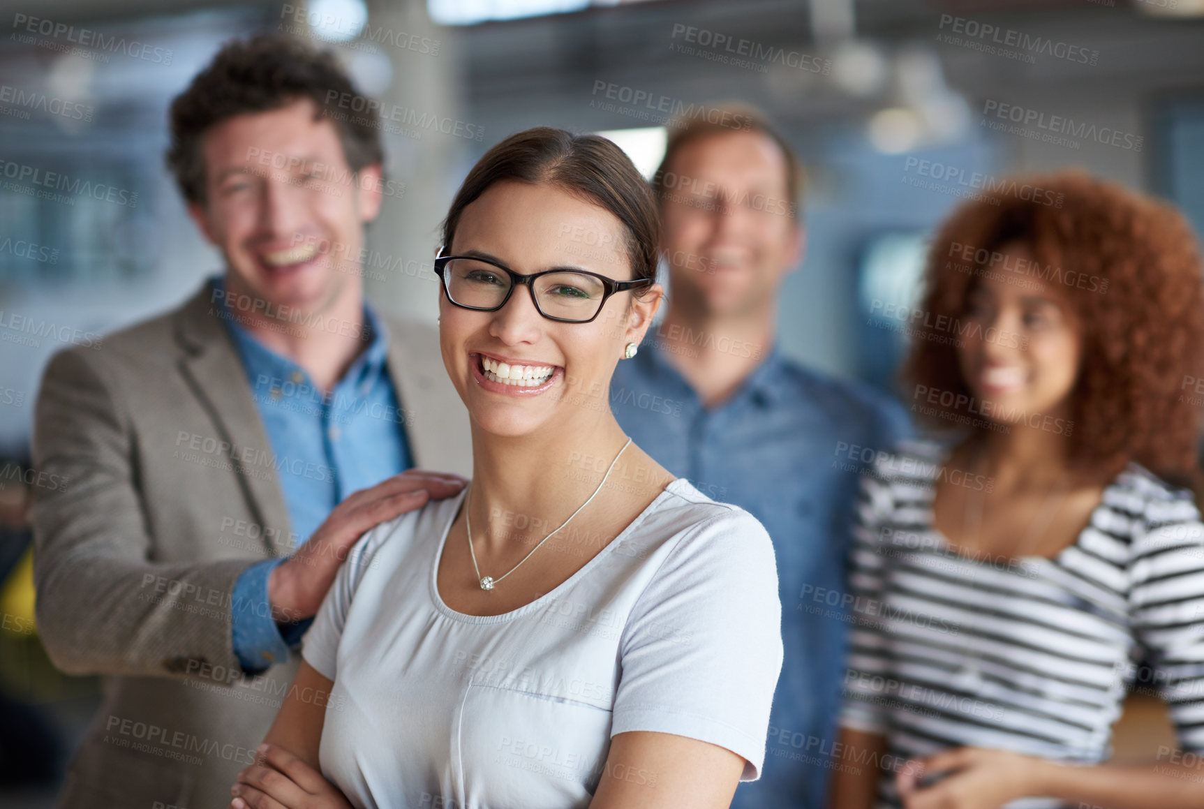 Buy stock photo Female leader, confident and team diversity in portrait in office, support and solidarity or teamwork. Woman, group and hand on shoulder for motivation, coworking and assistance in workplace