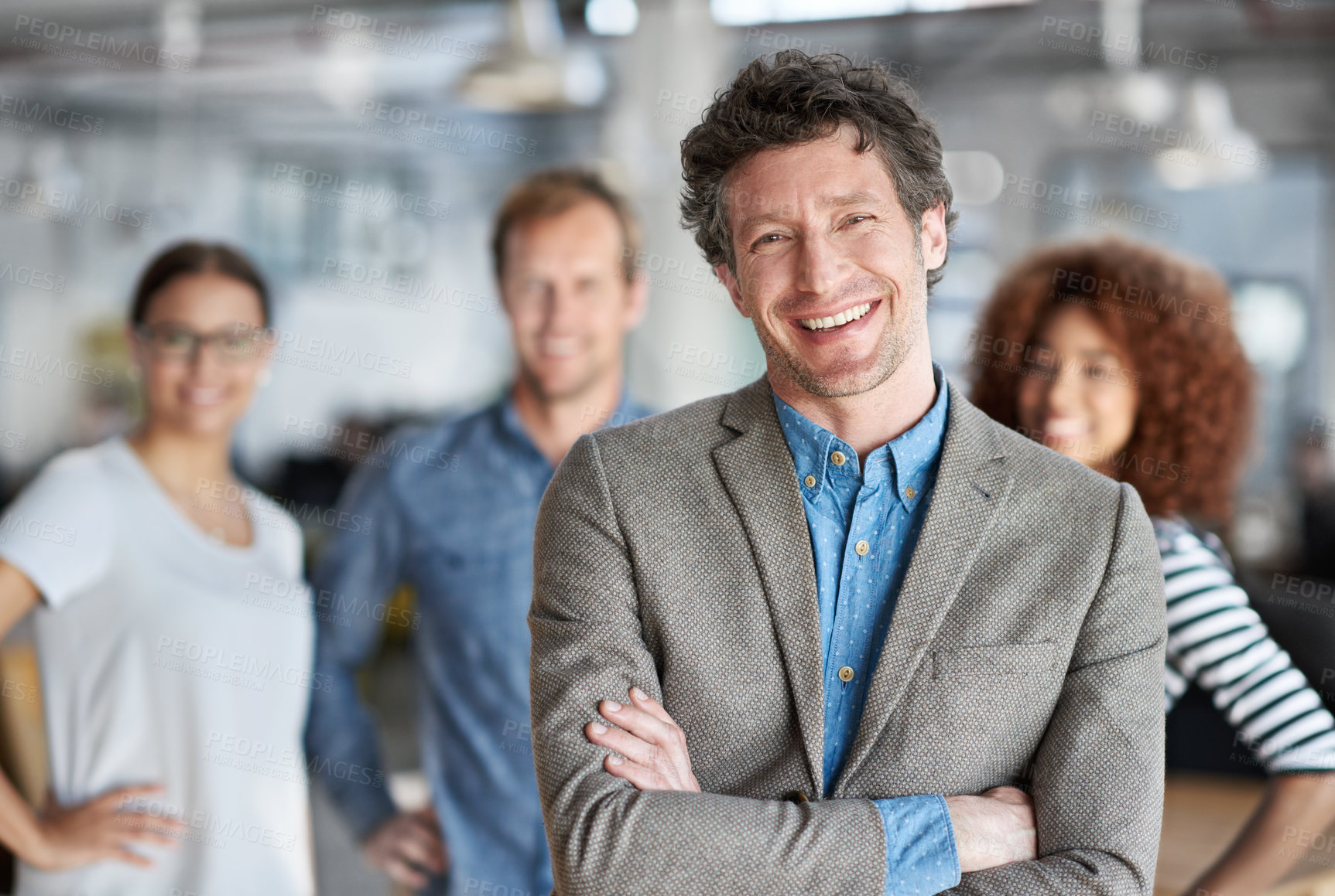 Buy stock photo Portrait, smile and ceo man with arms crossed in office for company, collaboration and startup business. Executive, team and diversity in workplace for project management, leadership and pride 