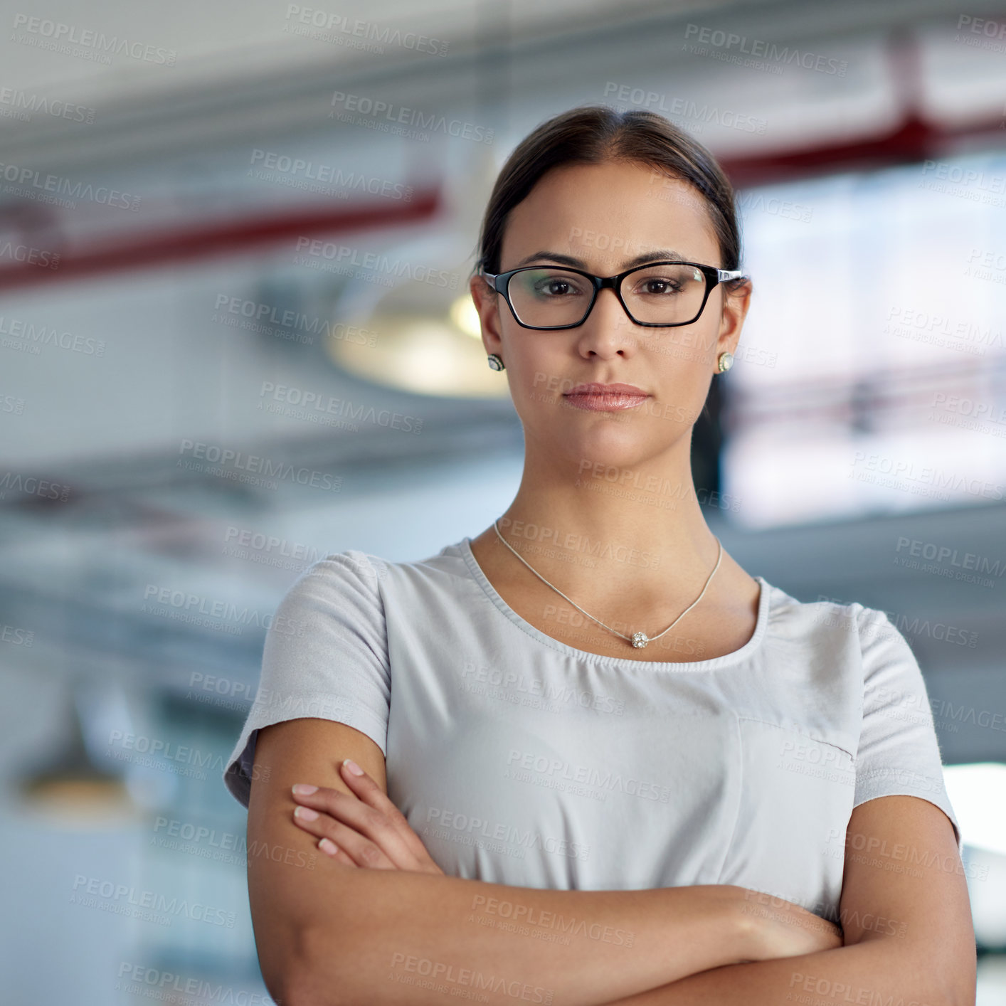 Buy stock photo Portrait, serious and business woman with arms crossed in office for creative career, job or startup company. Face, glasses and confident professional entrepreneur, editor or employee work in Brazil
