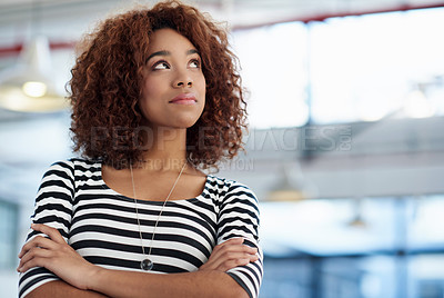 Buy stock photo Beautifull young woman looking away thoughtfully in an industrial office space