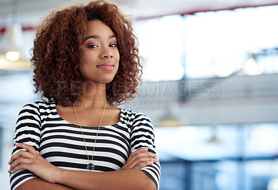 Buy stock photo Young woman giving you a confident smart look with an industrial looking space behind her