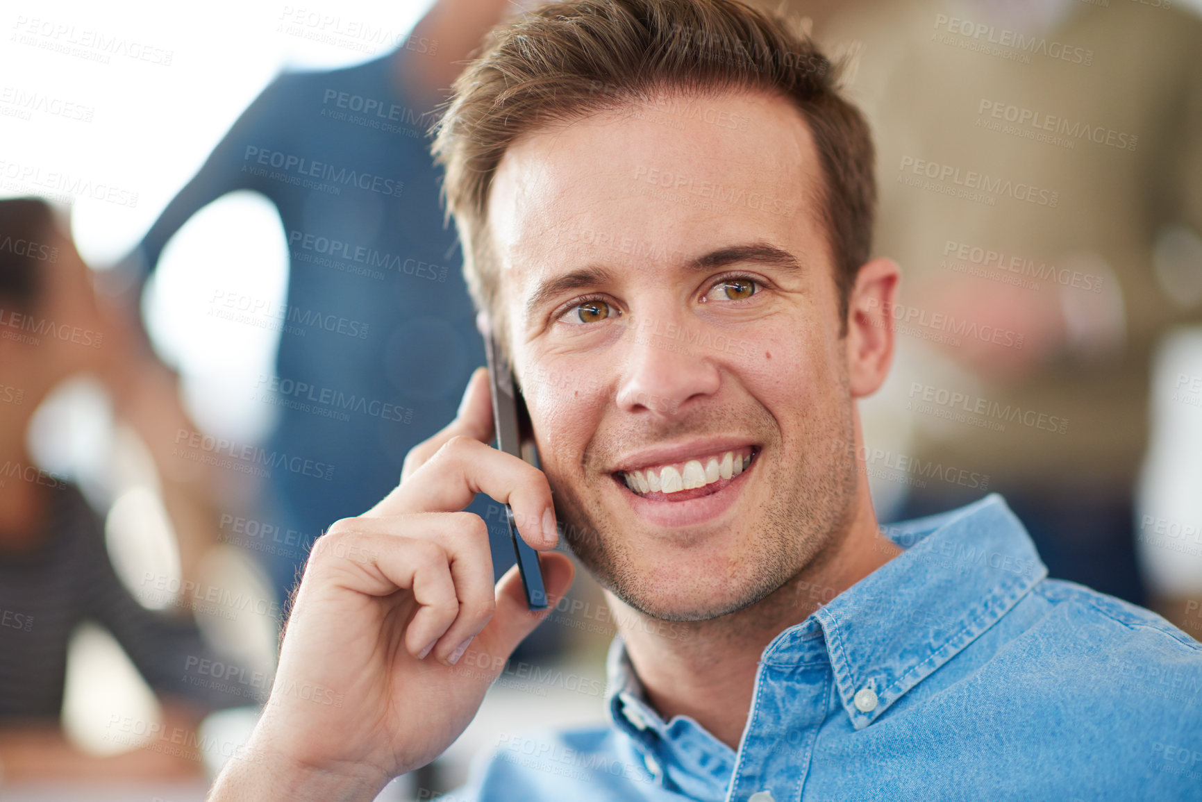 Buy stock photo Shot of a handsome young man sitting in a meeting