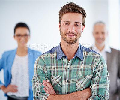 Buy stock photo Confident young man with people in the background