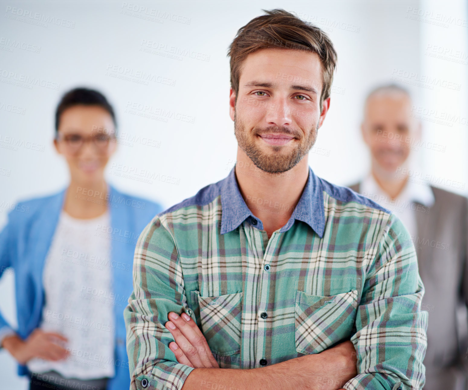 Buy stock photo Confident young man with people in the background