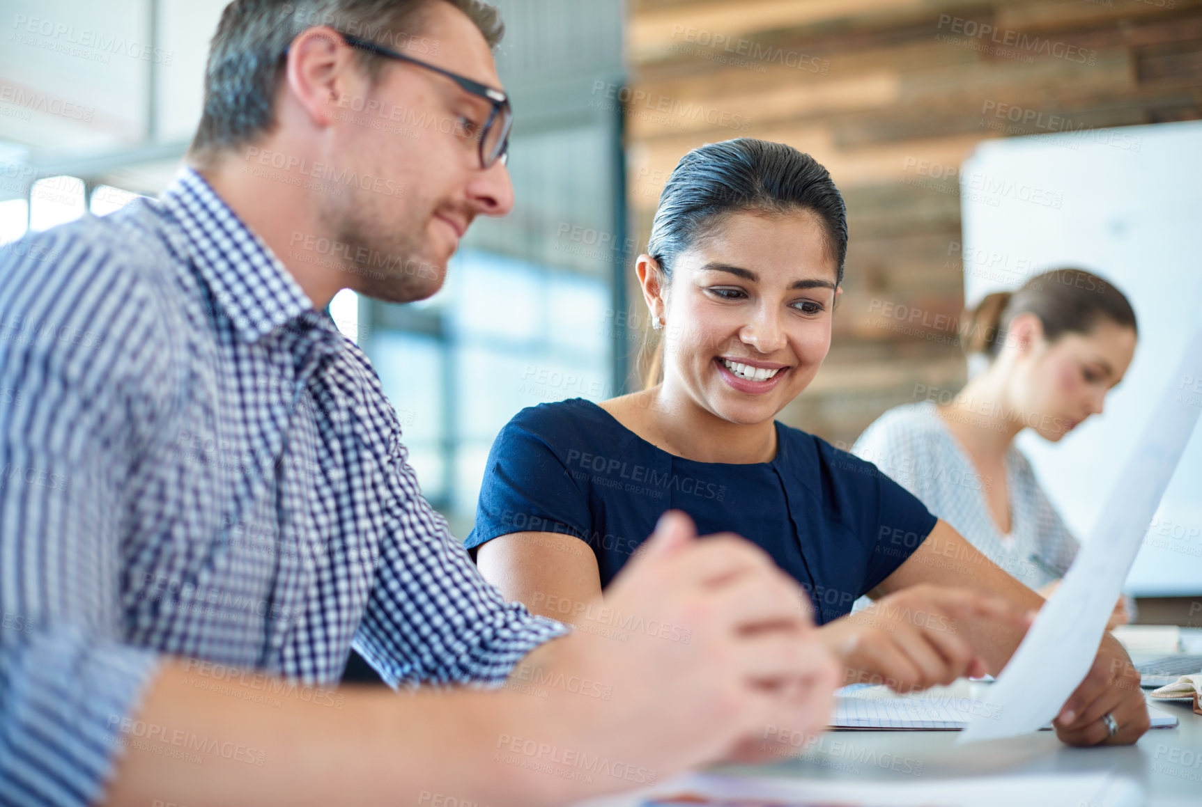 Buy stock photo Support, colleagues working with documents and in a modern office at their workplace together. Collaboration or teamwork, network or data and coworkers with paperwork in a boardroom of their work