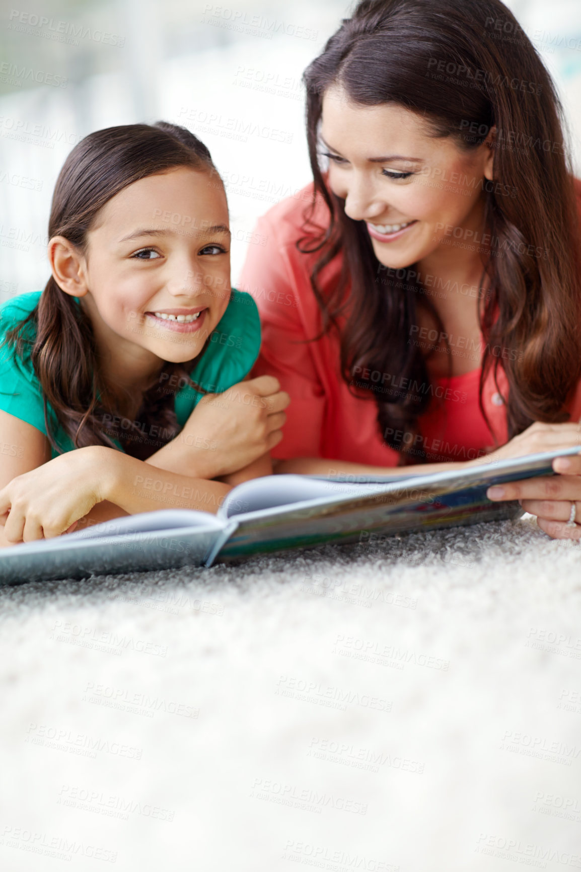 Buy stock photo Bonding, mom and daughter with book, home and education in lounge, growth and development of child. Learning, woman and helping girl with studying, family and love in living room, mother and kid