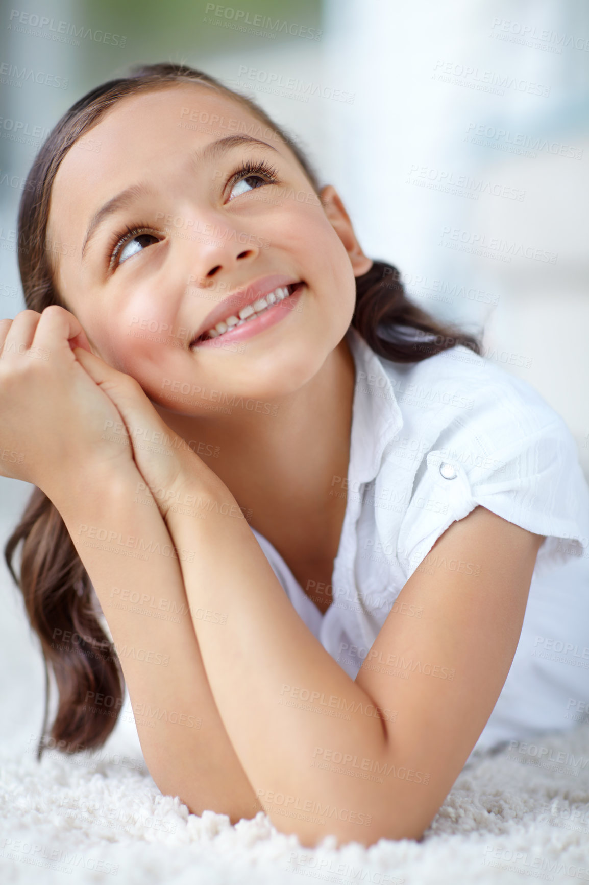 Buy stock photo Future, smile and thinking with girl on floor in living room of home for daydreaming or fantasy. Face, idea and imagine with happy child on carpet in apartment for development, growth or vision