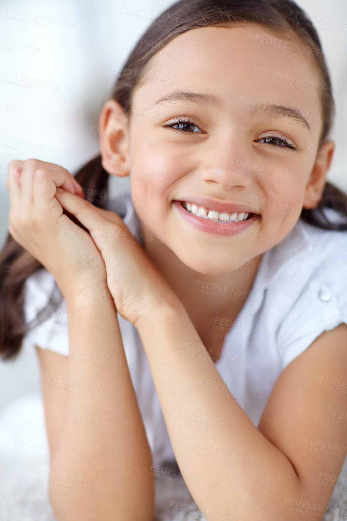 Buy stock photo Carpet, confidence or portrait of girl in home for joy, growth and fun on weekend in living room of house. Smile, face or healthy female kid alone for happiness, satisfaction or childhood in Spain