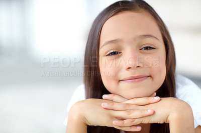 Buy stock photo Happy, confidence or portrait of girl in home for joy, growth or break in living room of house to relax. Smile, young or face of female kid alone for mockup space, satisfaction or childhood in Spain