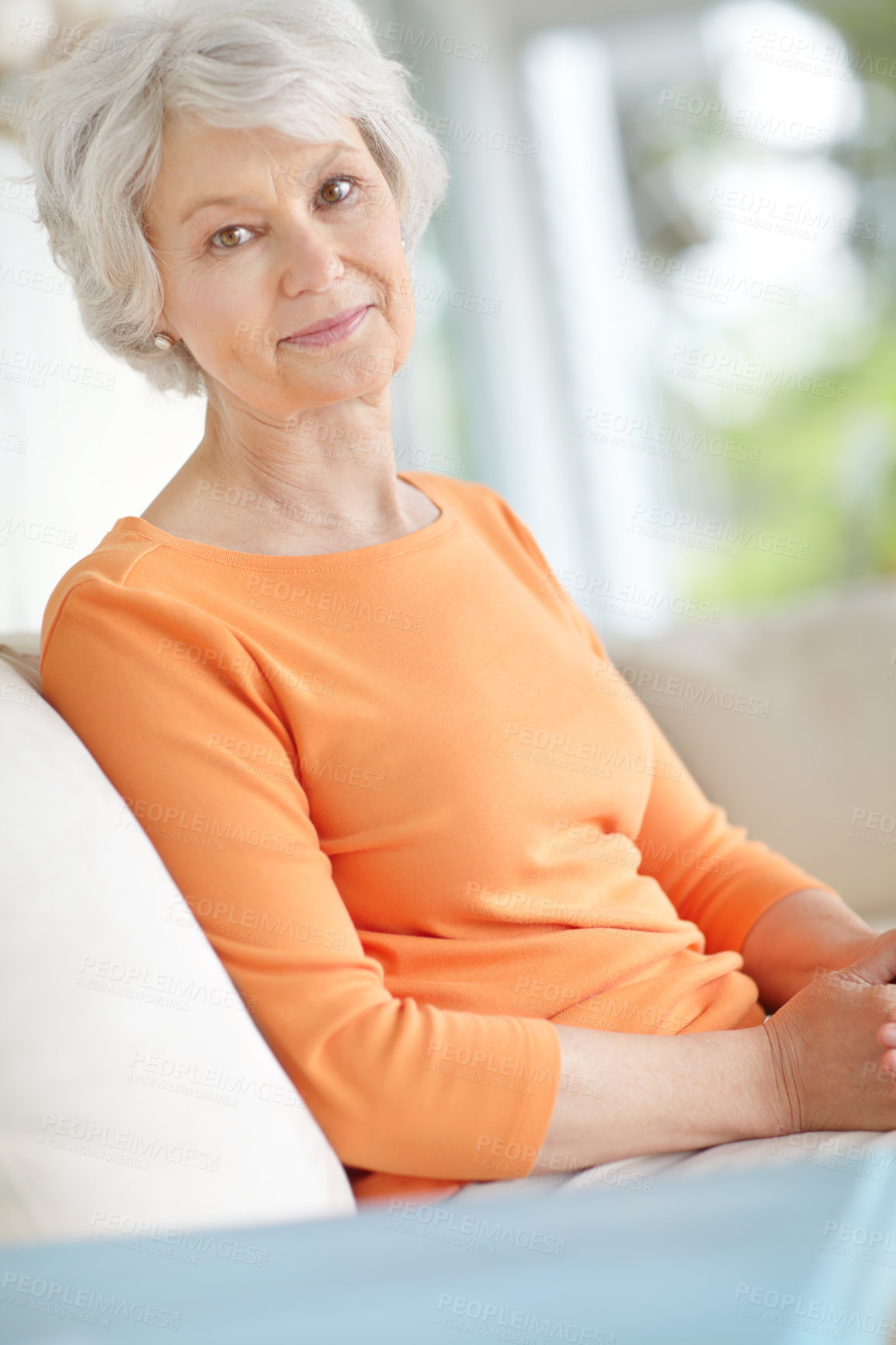 Buy stock photo Portrait, senior woman and relax on sofa in home living room with grandma, smile and and retirement break. Happy, elderly person and weekend for rest, confidence and house lounge for memory on couch