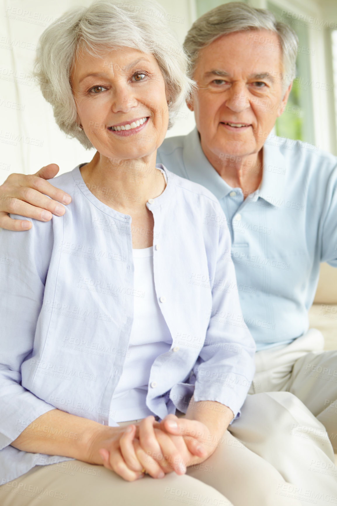 Buy stock photo Elderly couple, portrait and relax with smile in home for love, retirement and romantic connection. Happy, senior man and woman with care in house for marriage, bonding and peace on weekend together