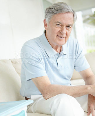 Buy stock photo Portrait, relax and wellness with senior man on sofa in living room of home for comfort or rest. Happy, retirement and smile with face of confident mature person in apartment for weekend time off