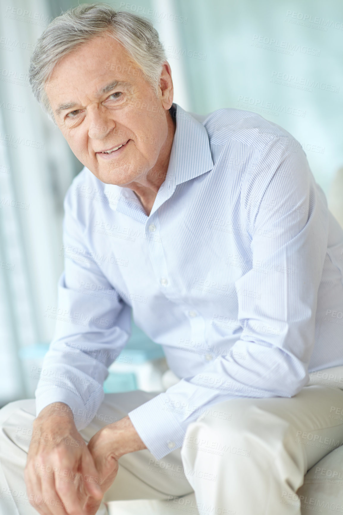 Buy stock photo Senior man, portrait and relax in home living room for retirement, good health and weekend with break. Elderly male, smile and healthy person on pension for positive mood, comfort and peace on sofa