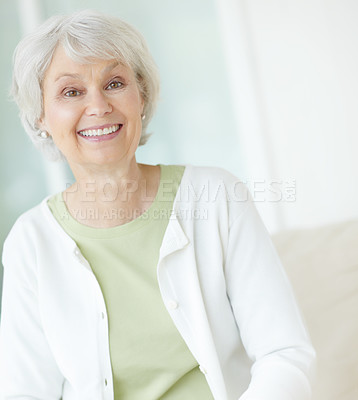 Buy stock photo Portrait, elderly woman and relax on sofa in home living room with grandma, smile and and retirement break. Happy, senior person and weekend for rest, confidence and house lounge for memory on couch