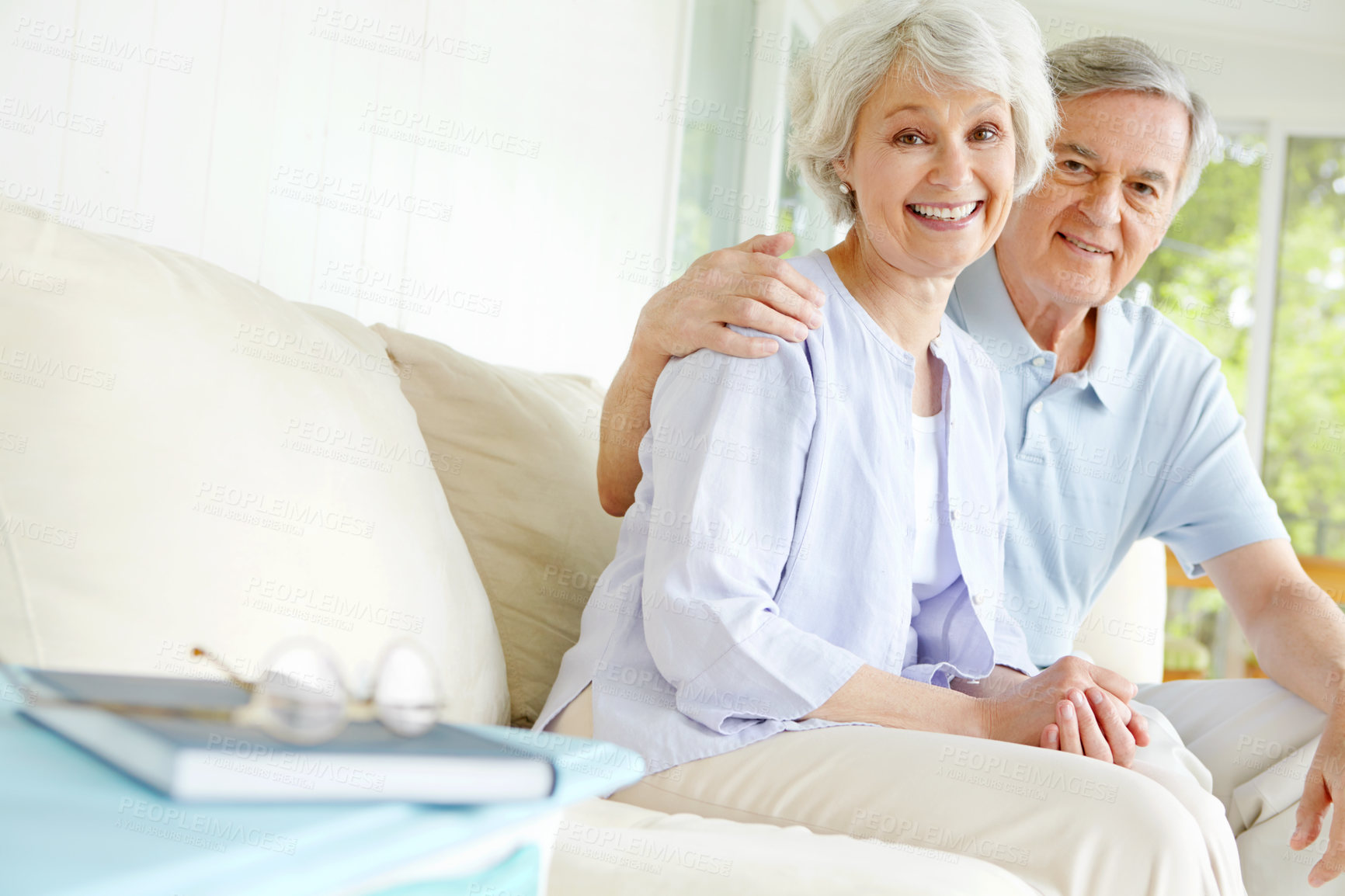 Buy stock photo Happy, portrait and elderly couple with smile on sofa for romantic connection on weekend together. Senior man, woman and home with love in commitment for marriage support, retirement and bonding