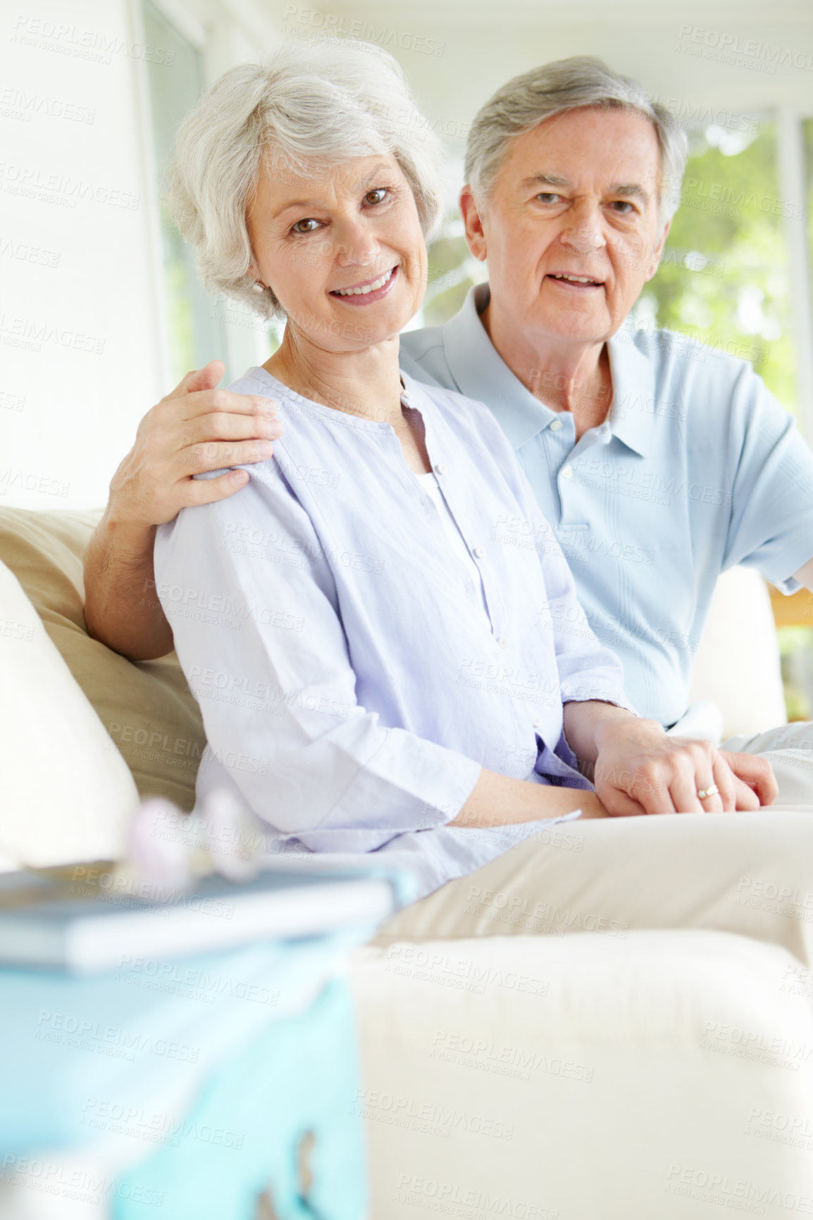 Buy stock photo Home, love and elderly couple with portrait on sofa for romantic bonding together on weekend. Senior woman, man and commitment with smile in house for marriage connection, retirement and support