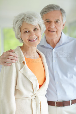 Buy stock photo Senior couple, happy and portrait with hug in home for retirement, bonding and romantic connection. Elderly woman, man and face with smile in house for marriage, peace and love on weekend together