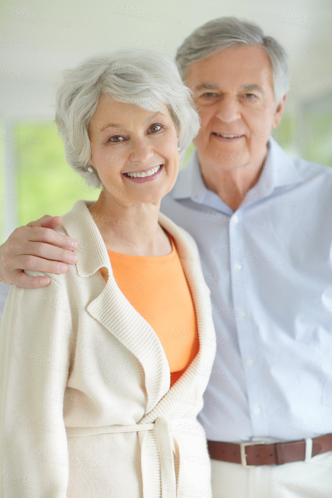 Buy stock photo Senior couple, happy and portrait with hug in home for retirement, bonding and romantic connection. Elderly woman, man and face with smile in house for marriage, peace and love on weekend together