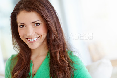 Buy stock photo Portrait of a beautiful young woman sitting at home