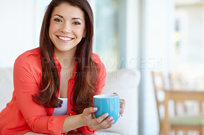 Buy stock photo Coffee, portrait and relax with woman on sofa in living room of home for wellness on weekend. Caffeine, confident and smile with face of happy person sitting in apartment for calm, peace or quiet