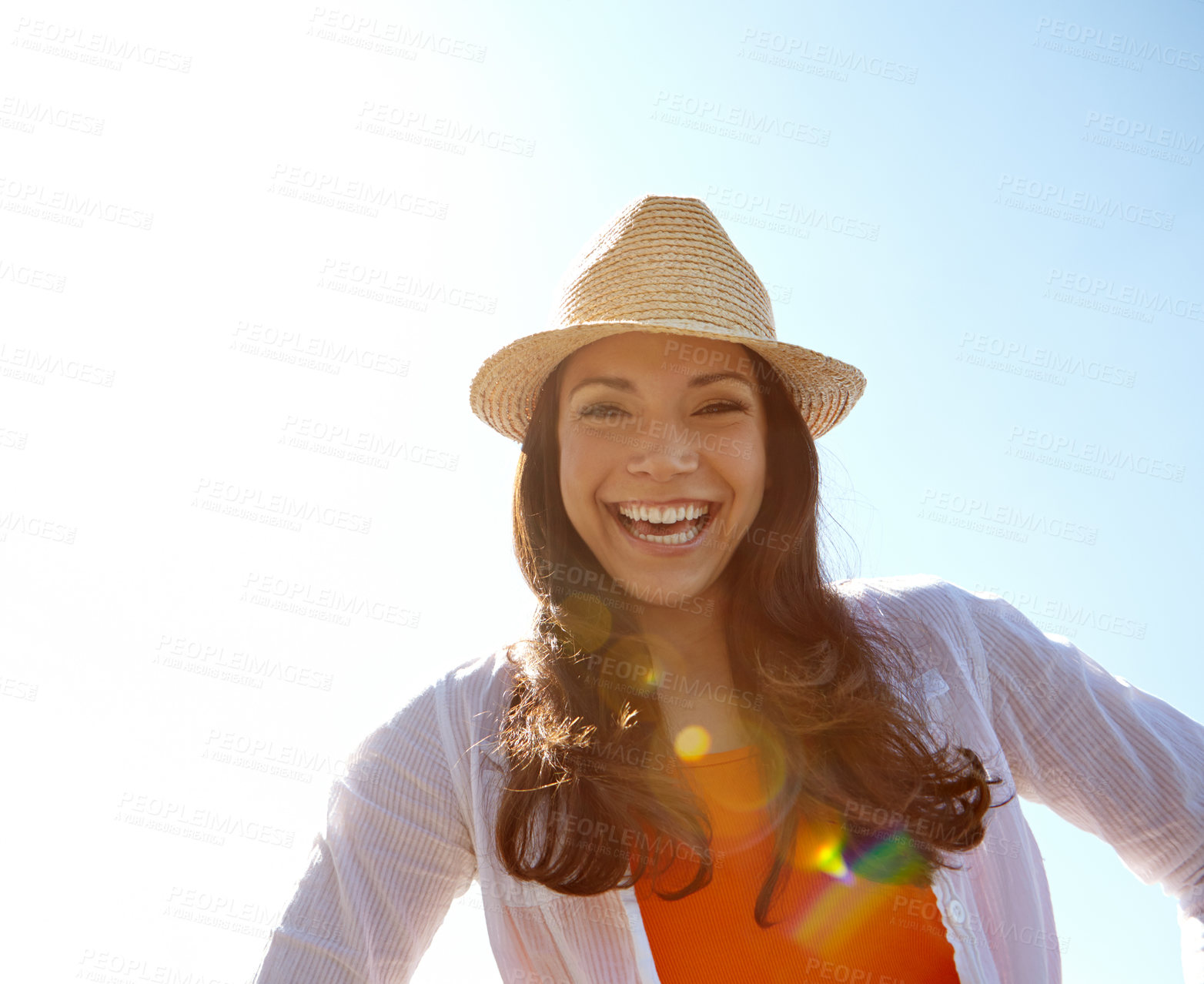 Buy stock photo Woman, outdoor laughing and blue sky in portrait, happy tourist and lens flare in Florence. Female person, funny joke and humor on adventure in nature, weekend trip and relax for peace on holiday